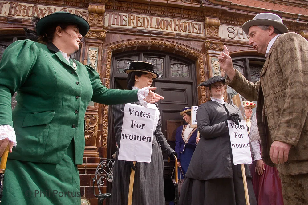 Street theatre showing how the suffragettes demonstrated in Edwardian times at Crich Tramway Village.
